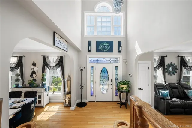 a view of living room kitchen with furniture and flat screen tv
