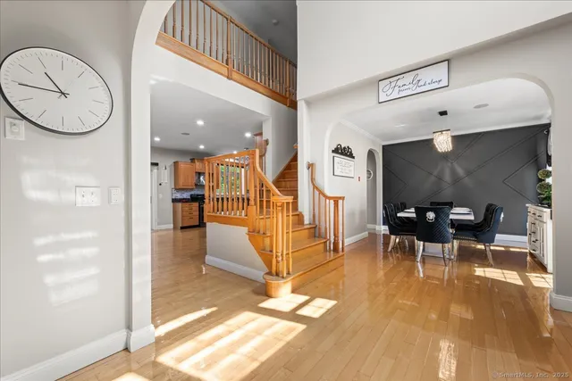a view of a livingroom with furniture and a floor to ceiling window