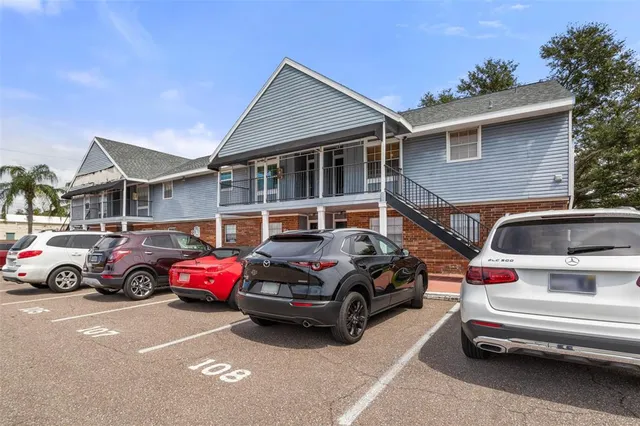a car parked in front of a house
