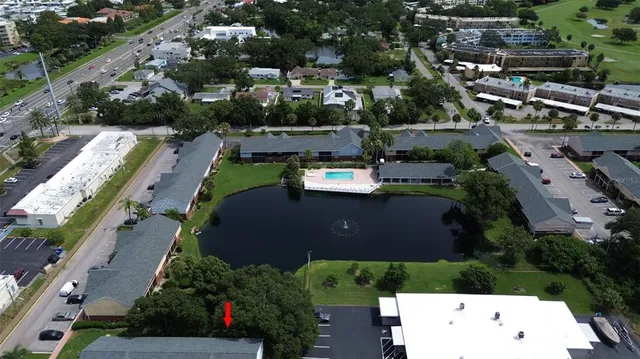 an aerial view of a house with a garden