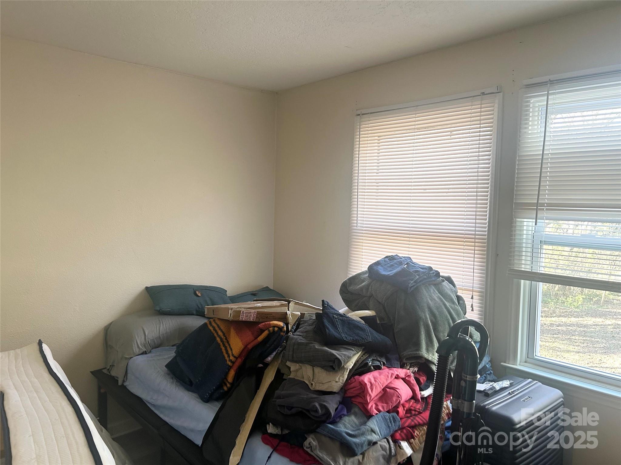 306 Valley Street Stanley, NC 28164 - Photo 11 of 19 a living room with furniture and a window