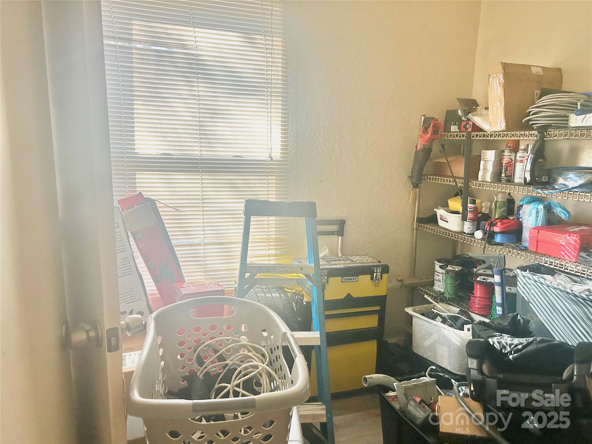 306 Valley Street Stanley, NC 28164 - Photo 12 of 19 a room with furniture and a window