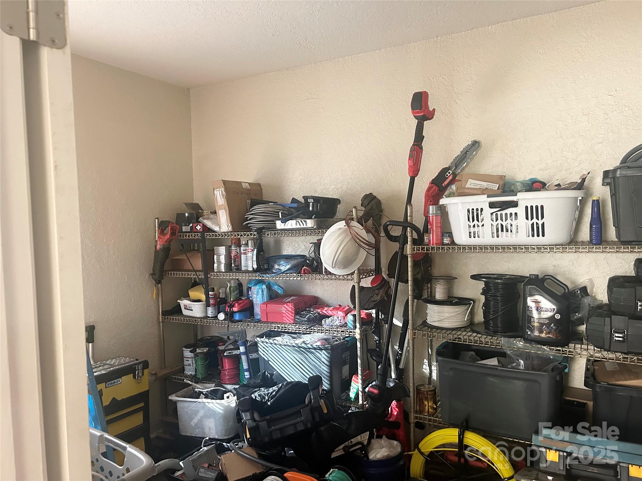 306 Valley Street Stanley, NC 28164 - Photo 14 of 19 a room with gym equipment