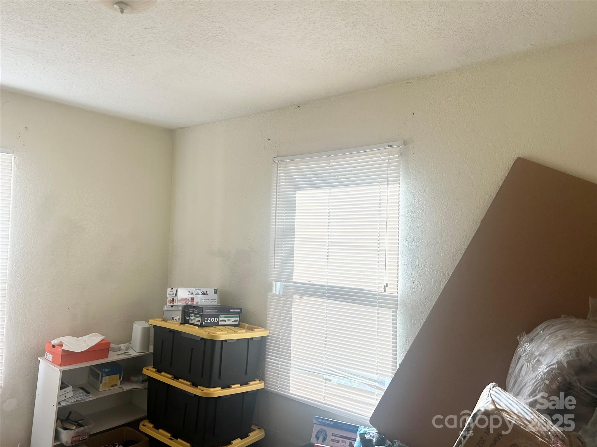 306 Valley Street Stanley, NC 28164 - Photo 15 of 19 a room with furniture and window