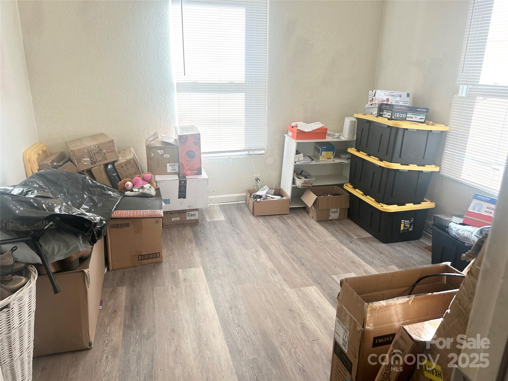 306 Valley Street Stanley, NC 28164 - Photo 16 of 19 a living room with furniture and a wooden floor