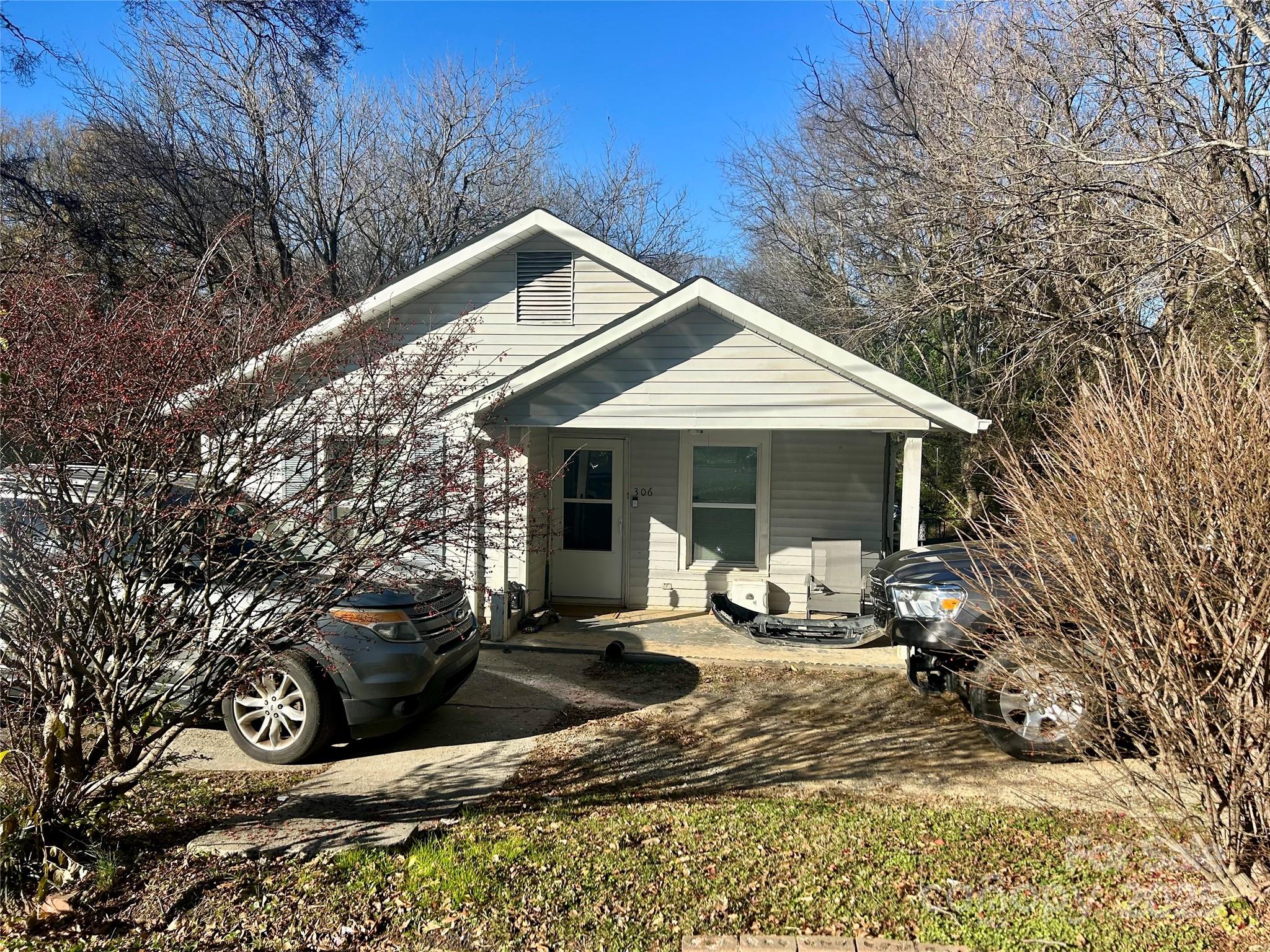 306 Valley Street Stanley, NC 28164 - Photo 2 of 19 a view of a house with backyard outdoor seating and backyard