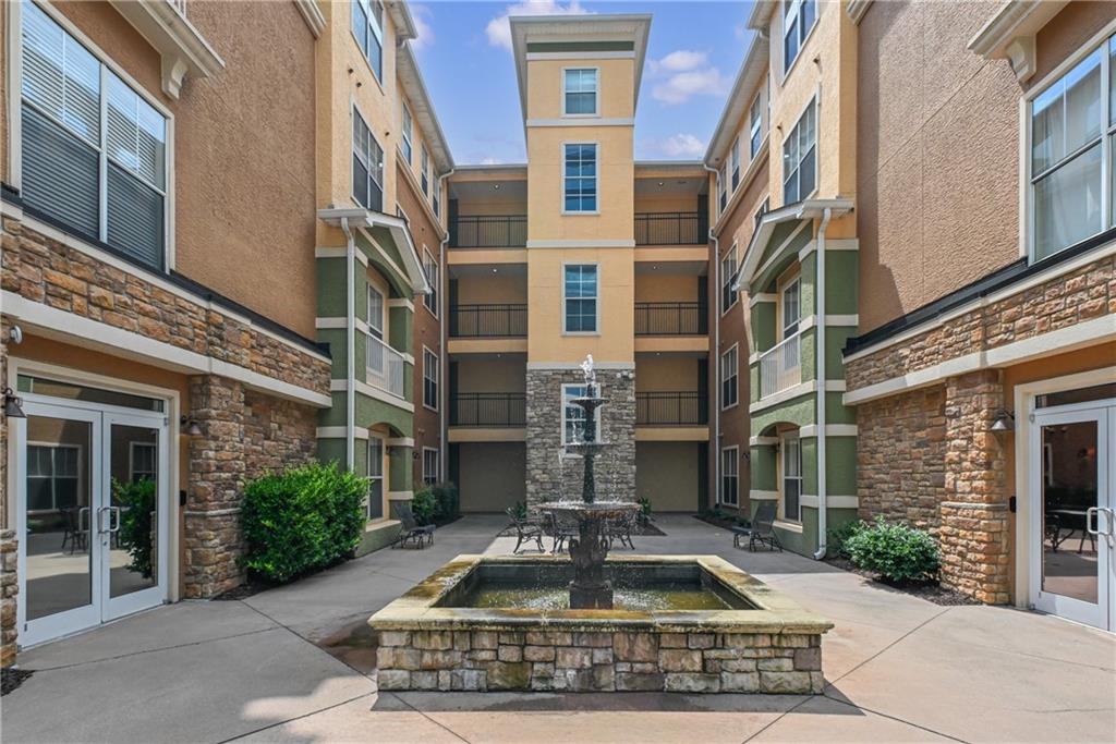 10 Perimeter Summit Boulevard, Unit 3311 Atlanta, GA 30319 - Photo 24 of 68 a front view of a multi story residential apartment building