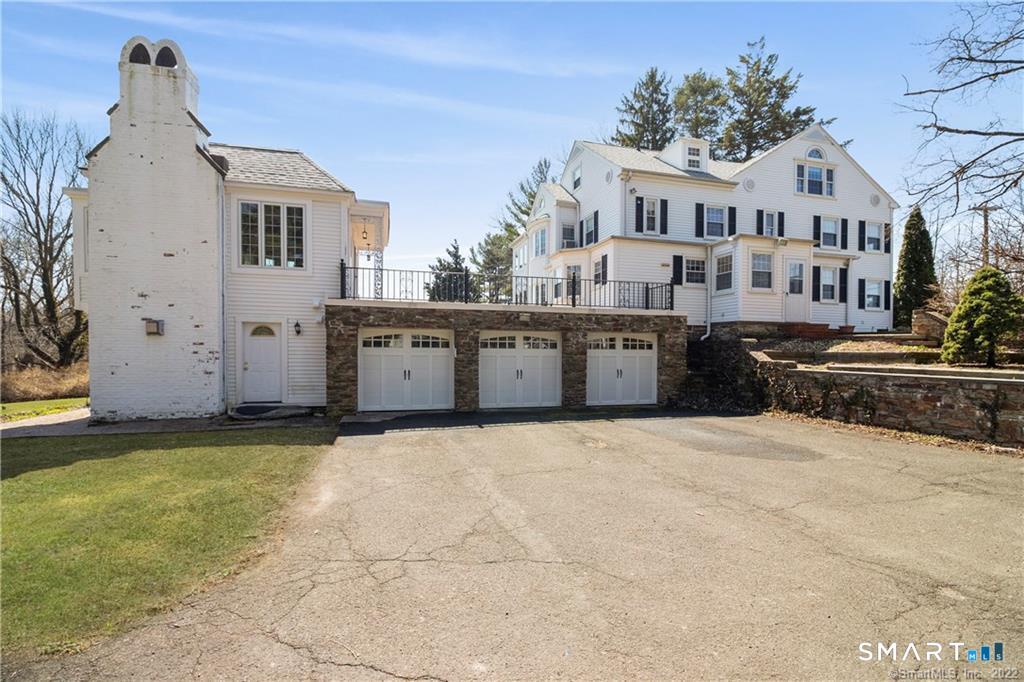 85 Cherry Hill Road Branford, CT 06405 - Photo 1 of 40 a large white house with a large space in front of it