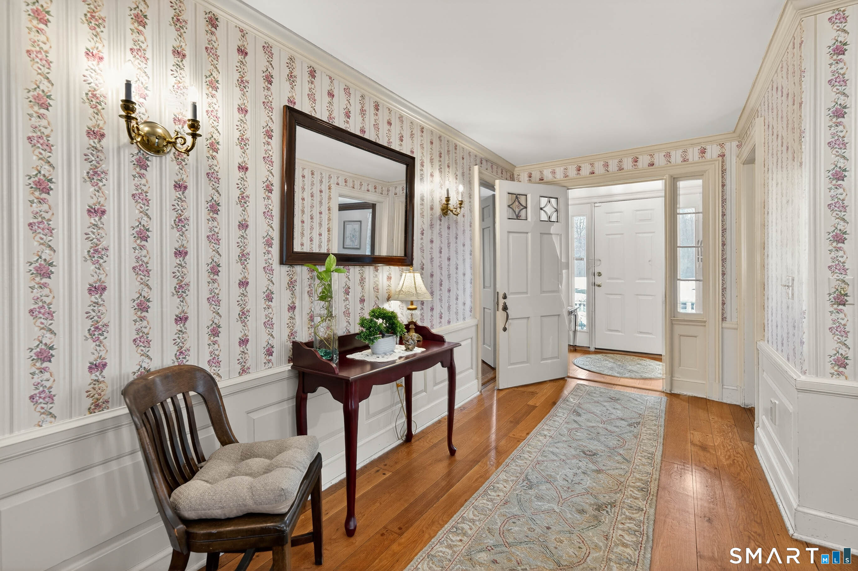 85 Cherry Hill Road Branford, CT 06405 - Photo 14 of 40 a view of a livingroom with furniture and hardwood floor