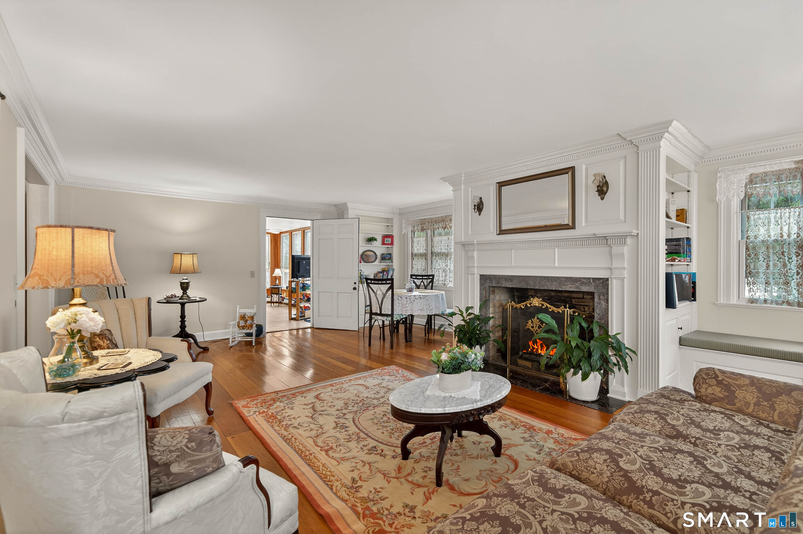 85 Cherry Hill Road Branford, CT 06405 - Photo 16 of 40 a living room with furniture and a fireplace