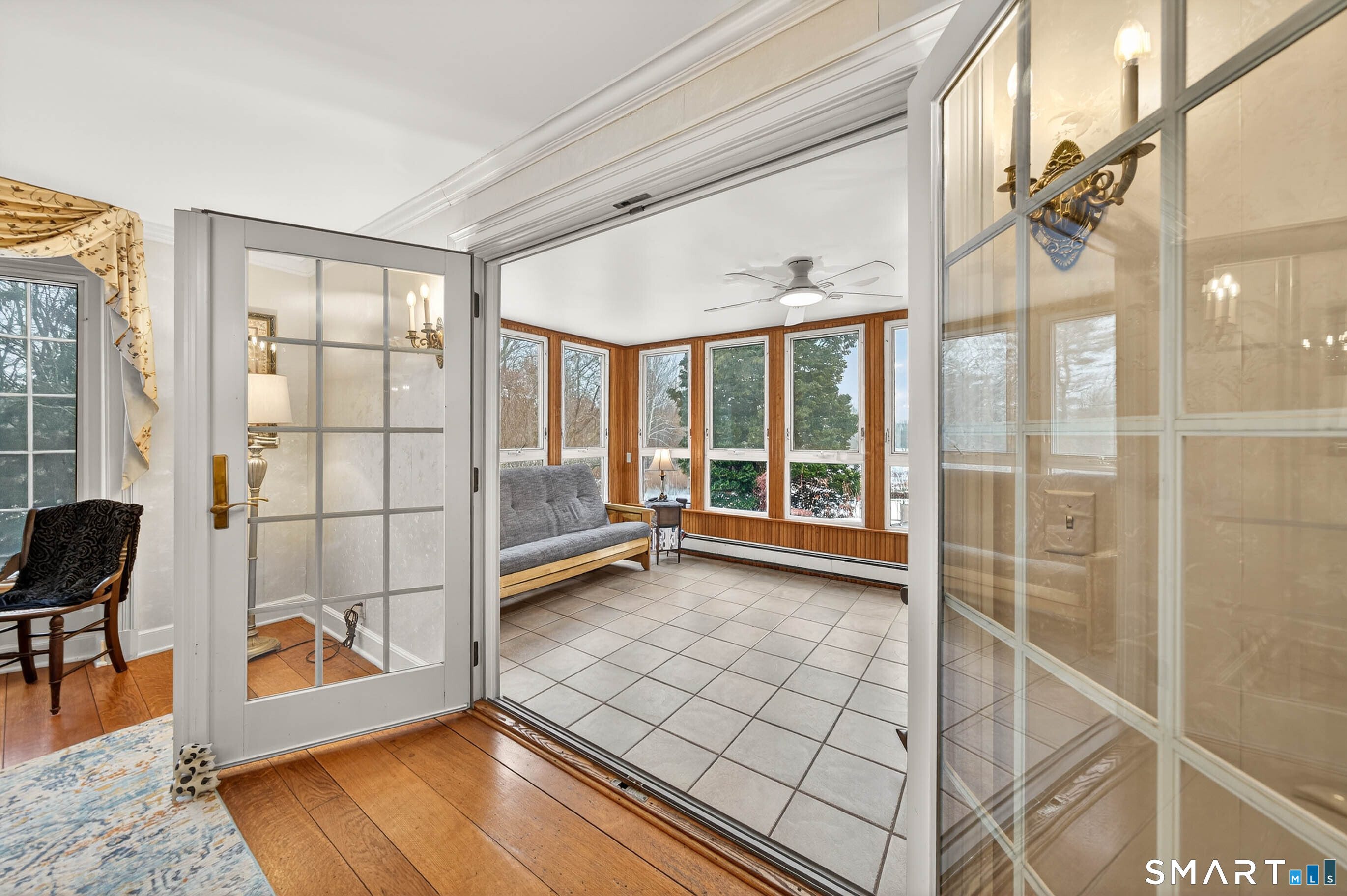 85 Cherry Hill Road Branford, CT 06405 - Photo 20 of 40 a view of a livingroom with a large window