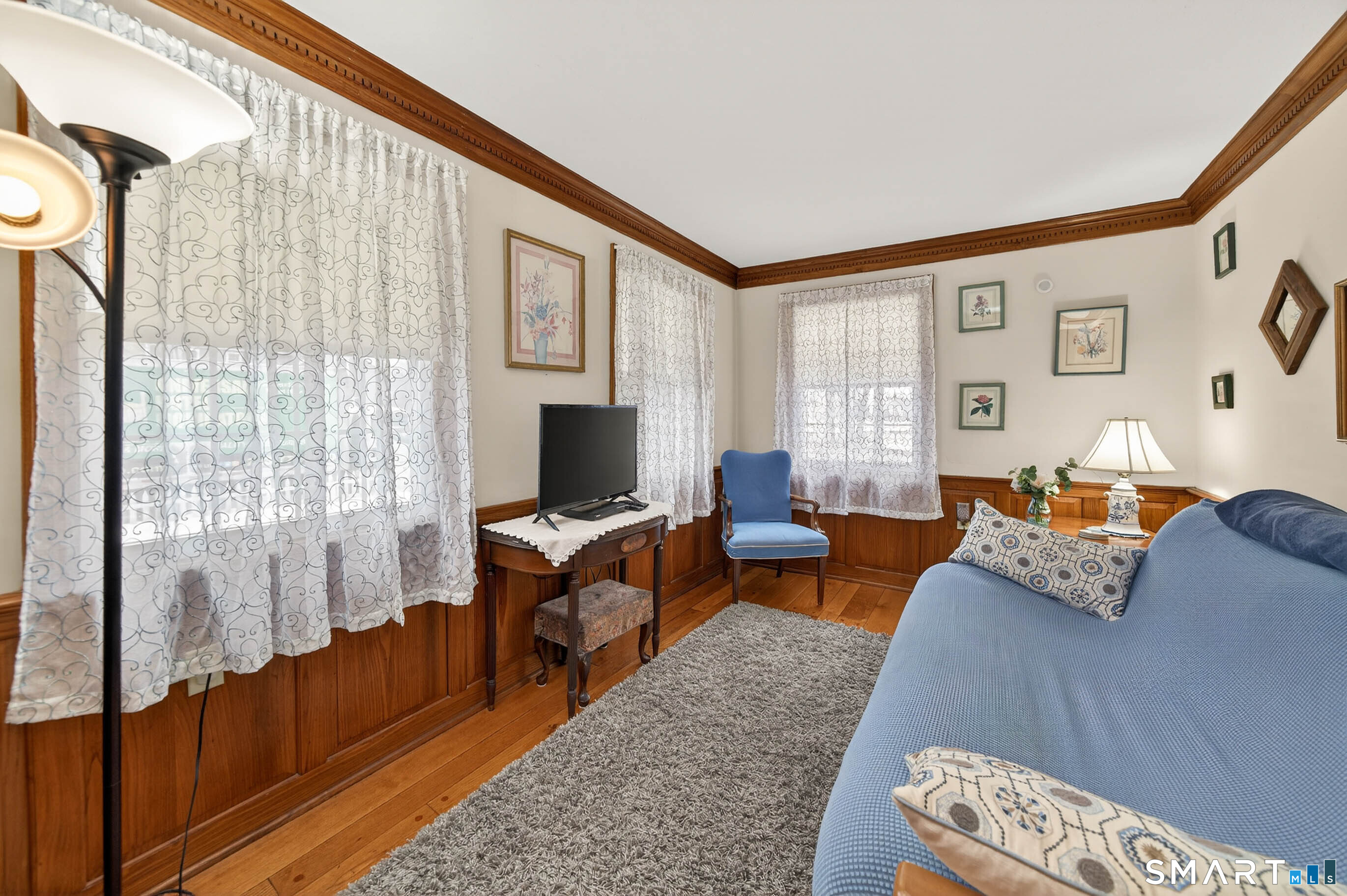 85 Cherry Hill Road Branford, CT 06405 - Photo 22 of 40 a living room with furniture and a flat screen tv