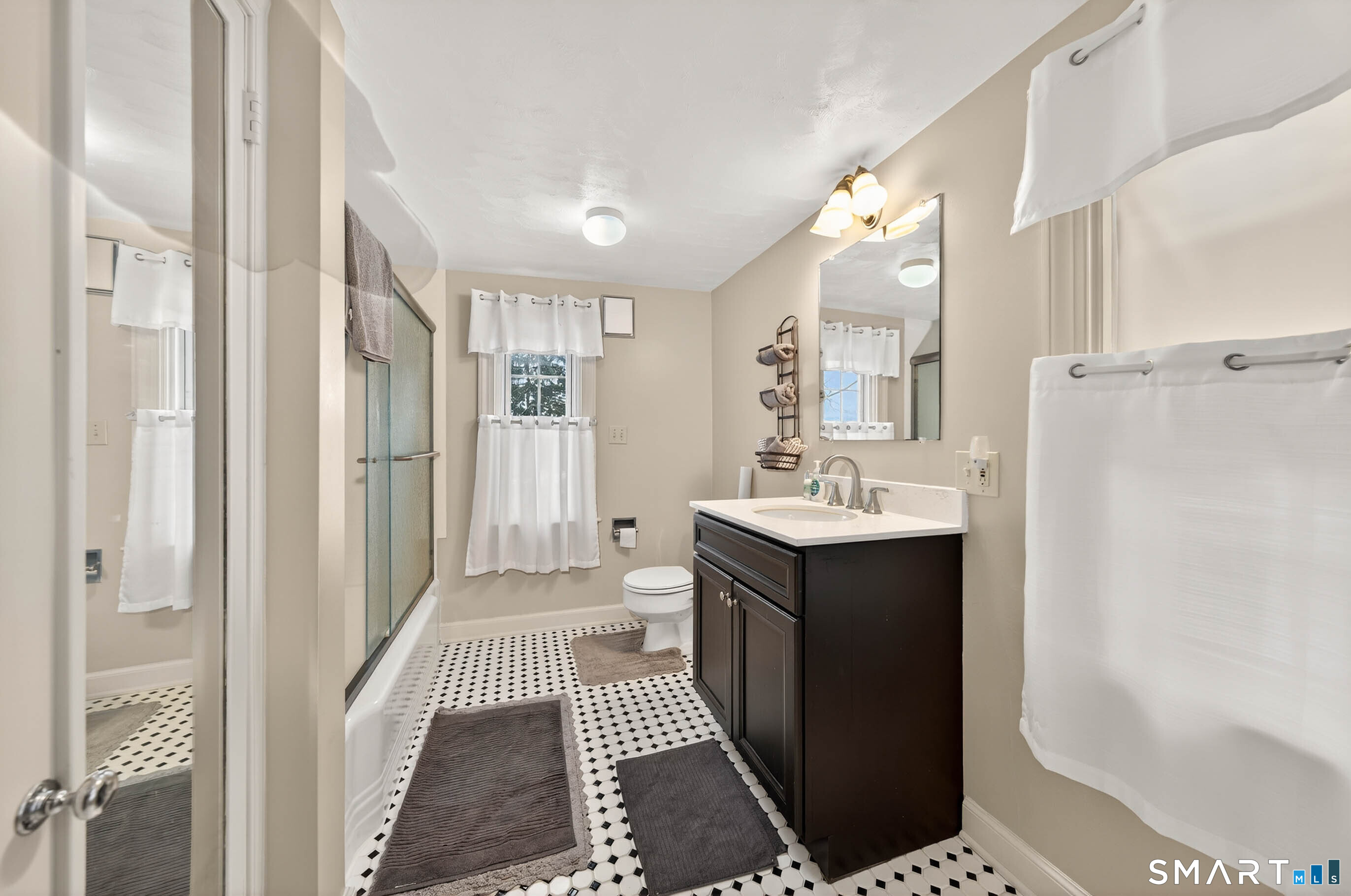 85 Cherry Hill Road Branford, CT 06405 - Photo 33 of 40 a bathroom with a sink toilet and shower