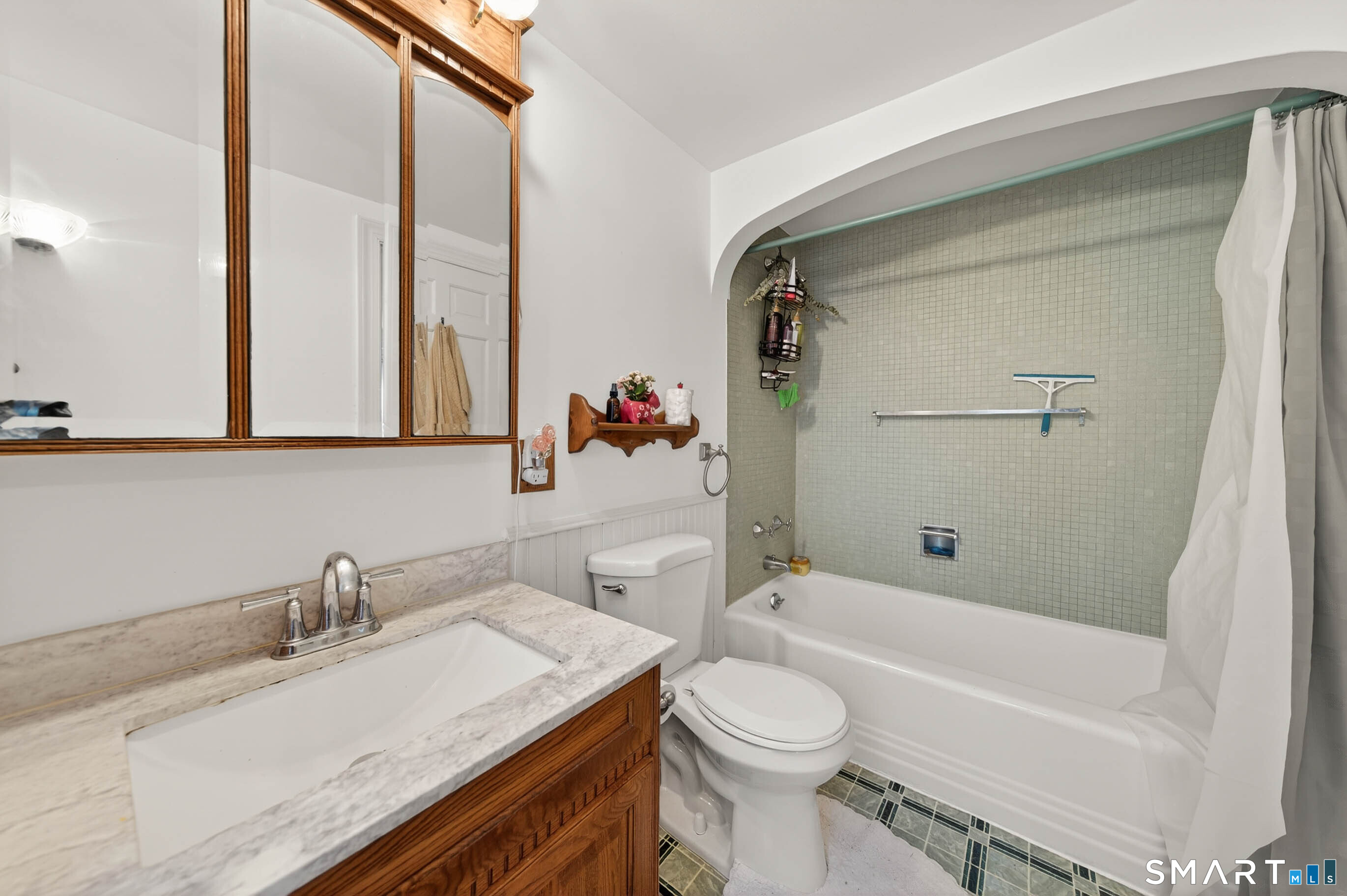 85 Cherry Hill Road Branford, CT 06405 - Photo 37 of 40 a bathroom with a granite countertop sink mirror vanity and toilet