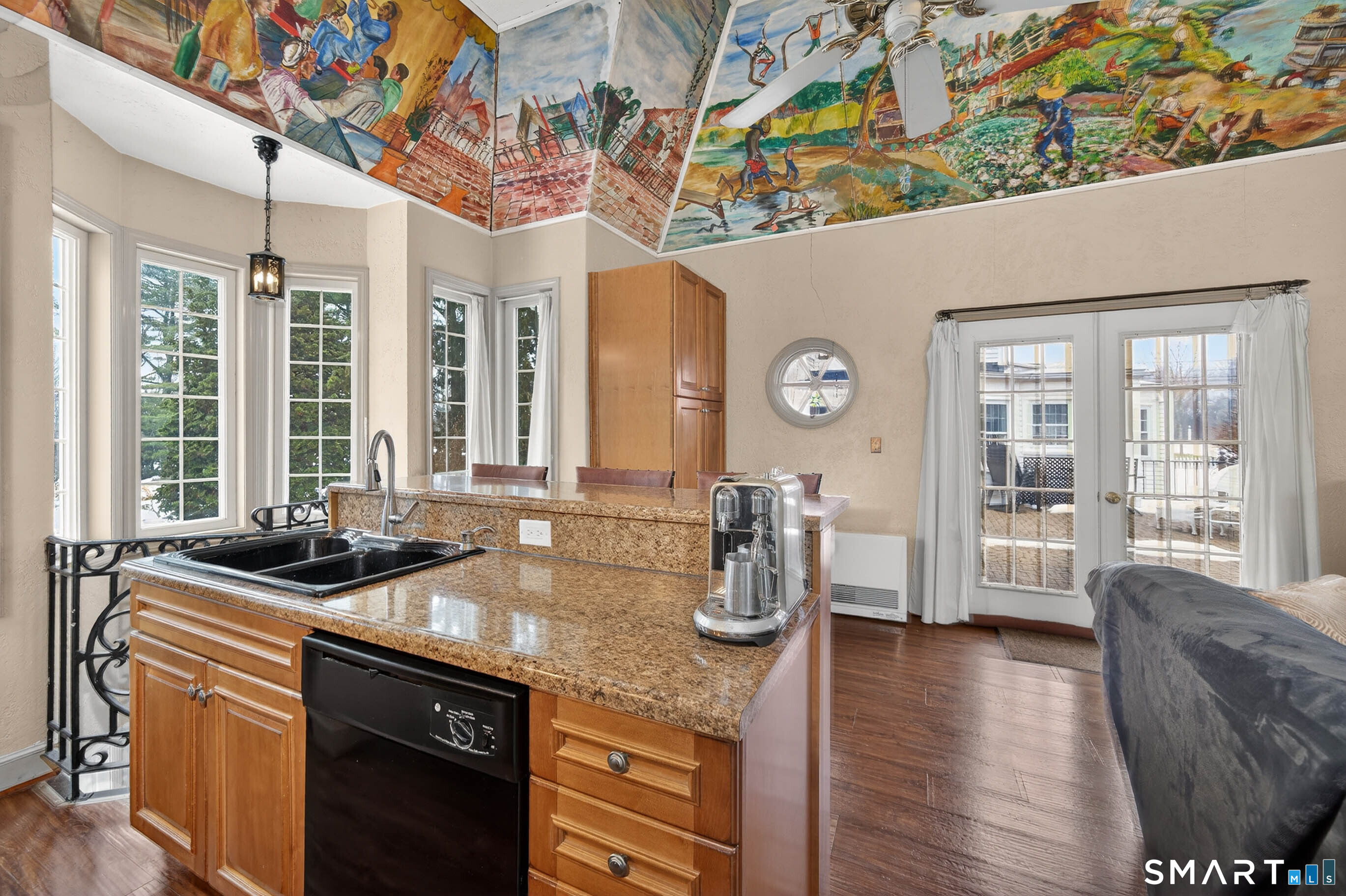 85 Cherry Hill Road Branford, CT 06405 - Photo 9 of 40 a kitchen with a sink stove and wooden floor