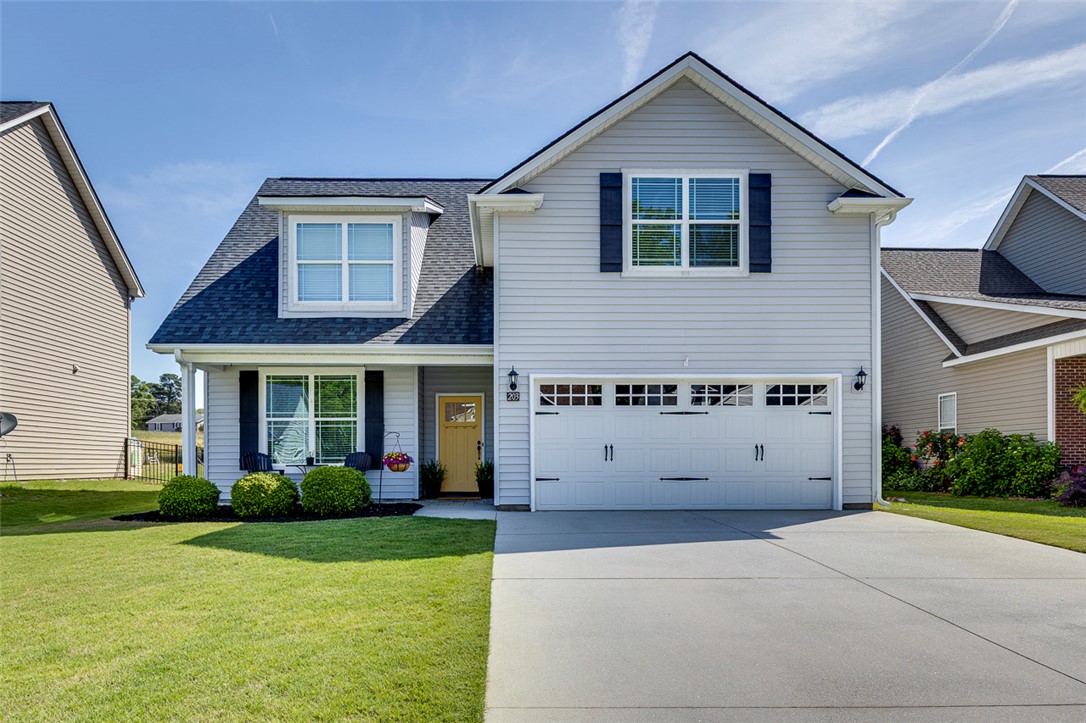 203 Streams Way Anderson, SC 29625 - Photo 1 of 47 This charming home offers a welcoming facade with a well-maintained lawn and classic shutters.