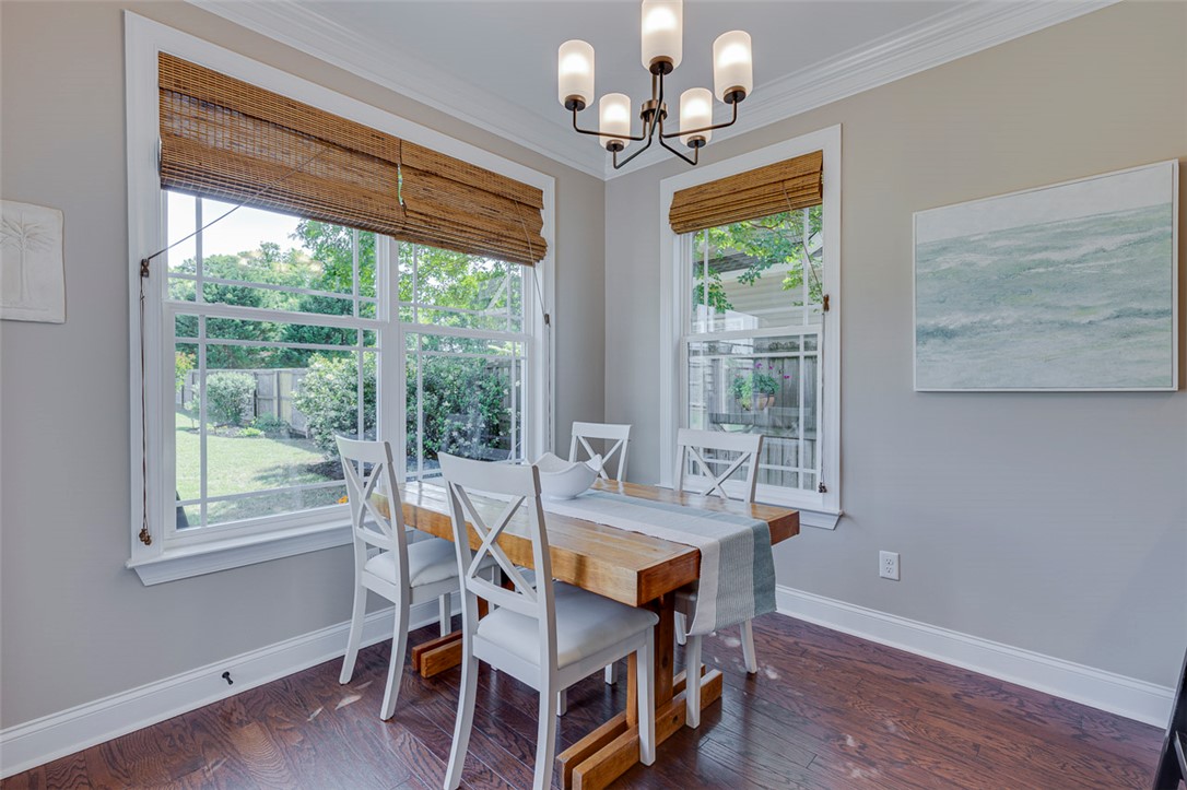 203 Streams Way Anderson, SC 29625 - Photo 25 of 47 This bright dining area features ample natural light and rich wood flooring.