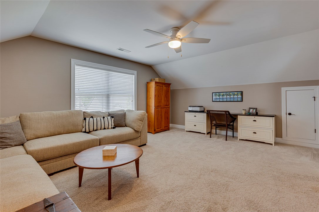 203 Streams Way Anderson, SC 29625 - Photo 34 of 47 This versatile bonus room features a comfortable lounge area and a functional workspace.