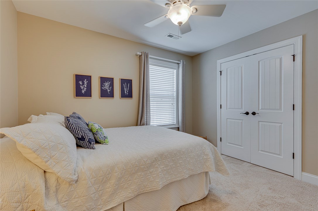 203 Streams Way Anderson, SC 29625 - Photo 35 of 47 This cozy bedroom offers a tranquil retreat with soft lighting and ample storage space.