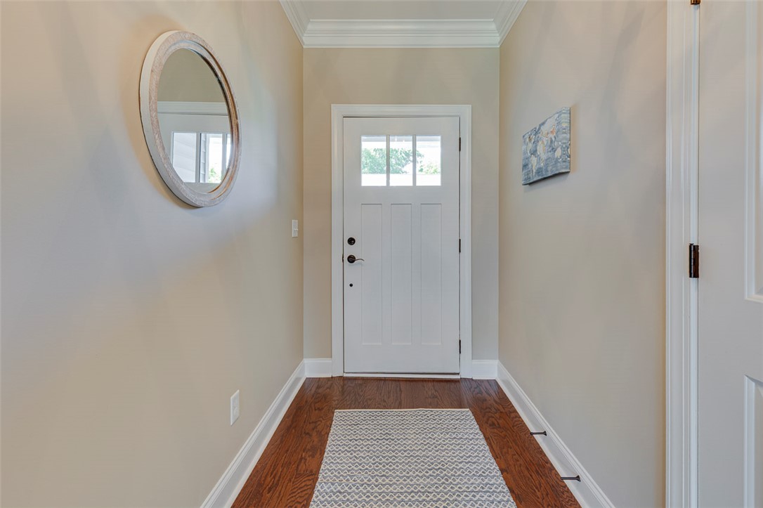 203 Streams Way Anderson, SC 29625 - Photo 5 of 47 This entry welcomes all with warm wooden floors and a stylish door featuring decorative glass.