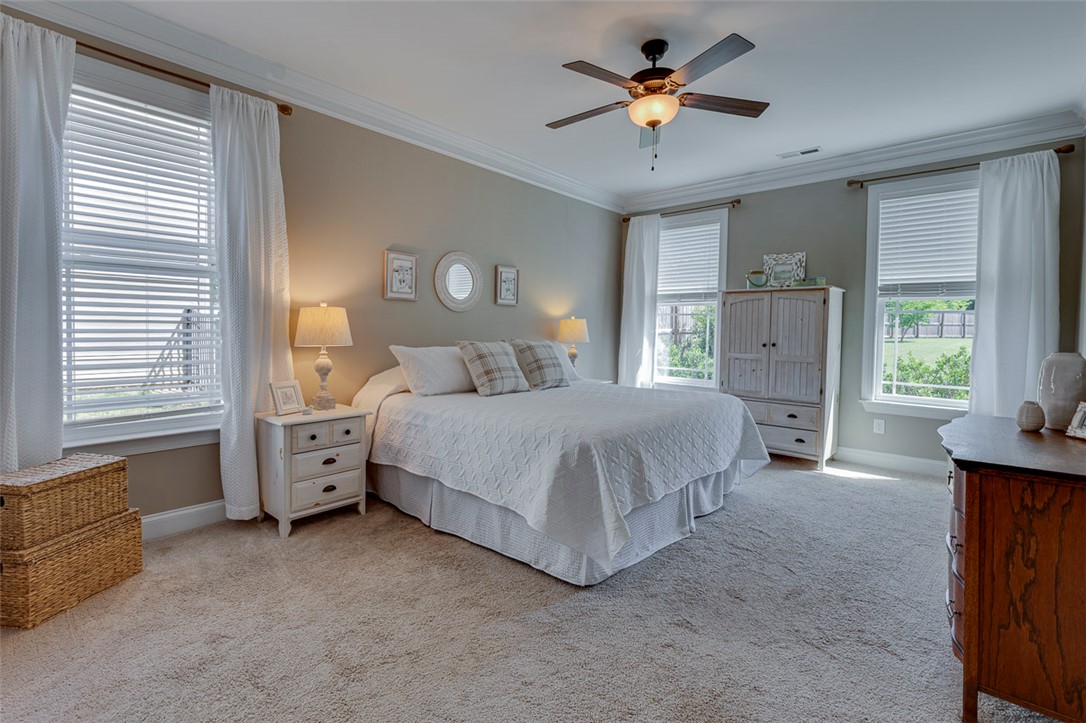 203 Streams Way Anderson, SC 29625 - Photo 7 of 47 This peaceful bedroom provides a comfortable retreat with ample natural light.