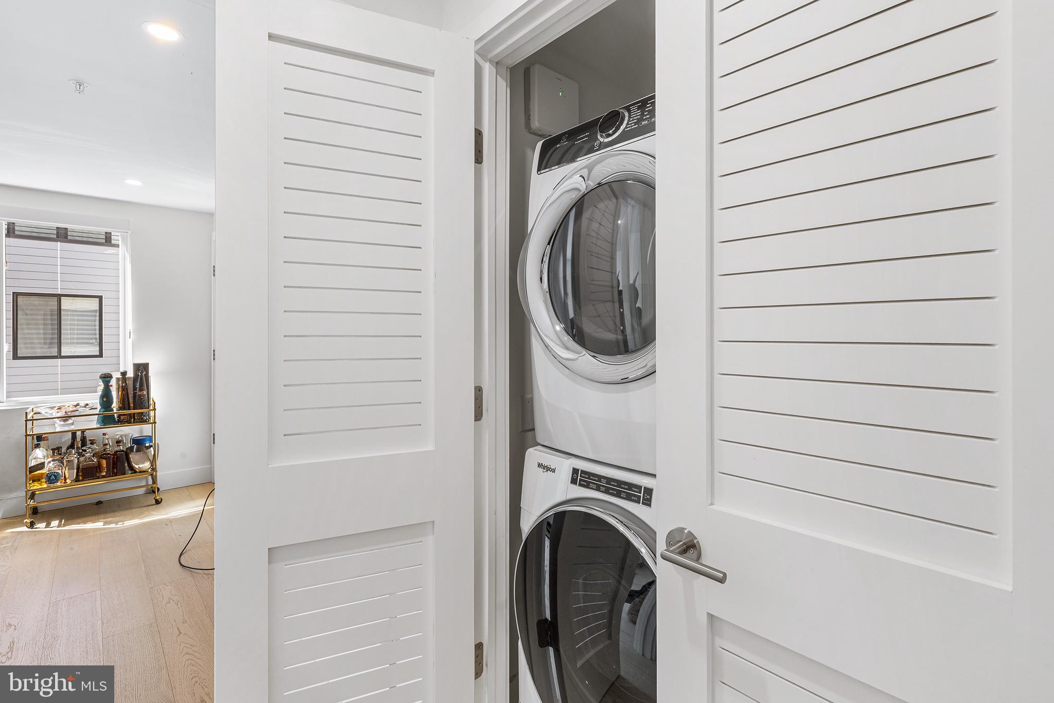 116 North Croskey Street Philadelphia, PA 19103 - Photo 25 of 57 a utility room with dryer and washer
