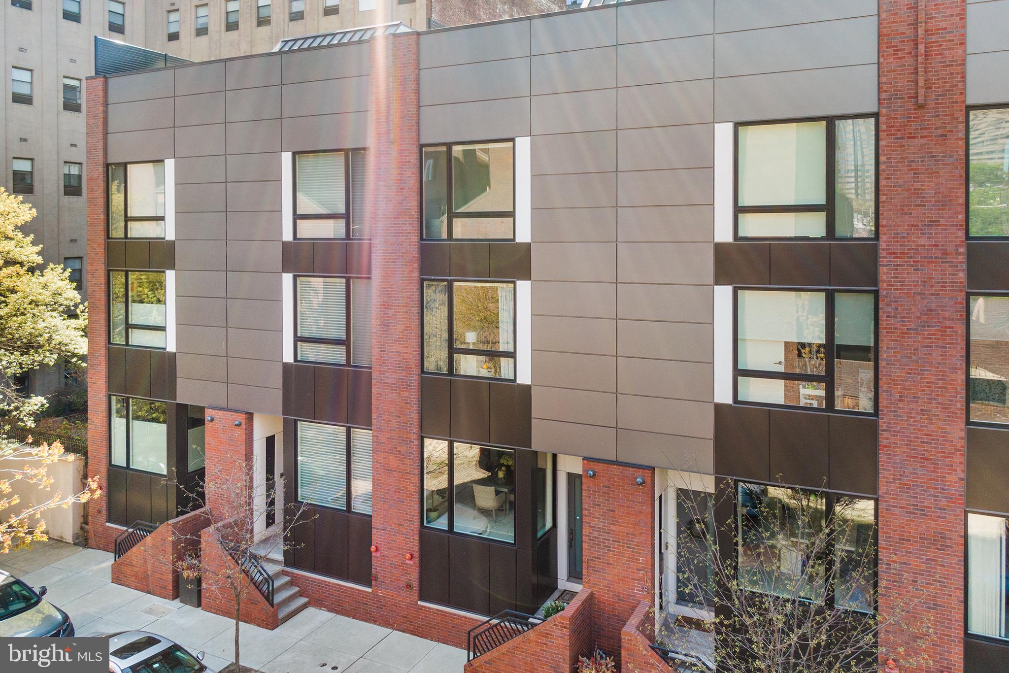 116 North Croskey Street Philadelphia, PA 19103 - Photo 3 of 57 a bathroom with a sink and a mirror