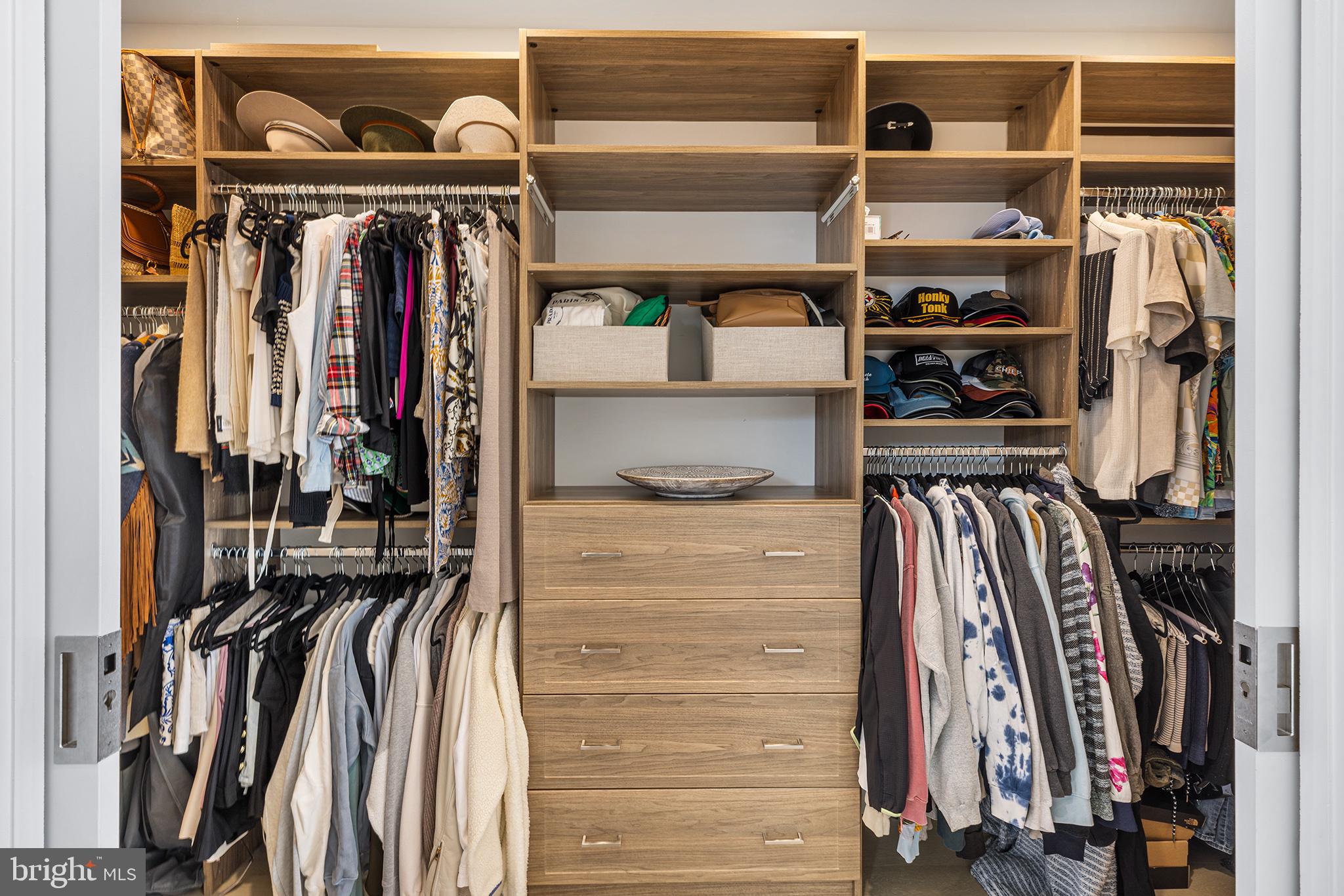 116 North Croskey Street Philadelphia, PA 19103 - Photo 31 of 57 a view of walk in closet with clothes and shoes