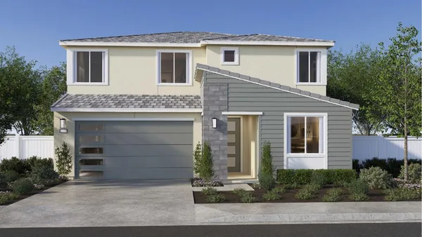 a front view of a house with a garage
