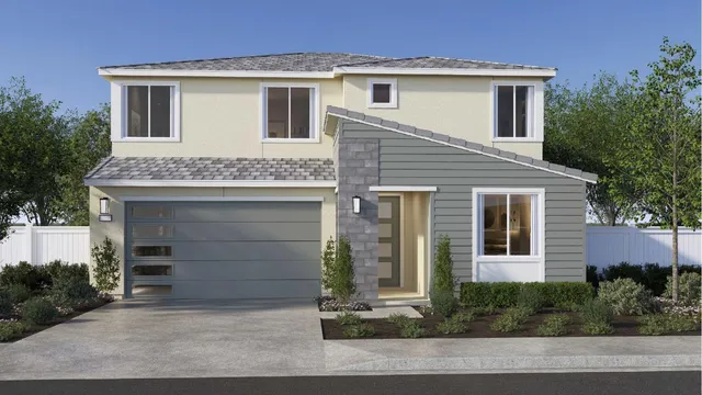 a front view of a house with a garage