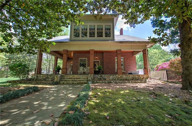 a front view of a house with a garage