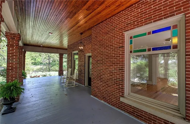 a front view of a house with a yard and a garage