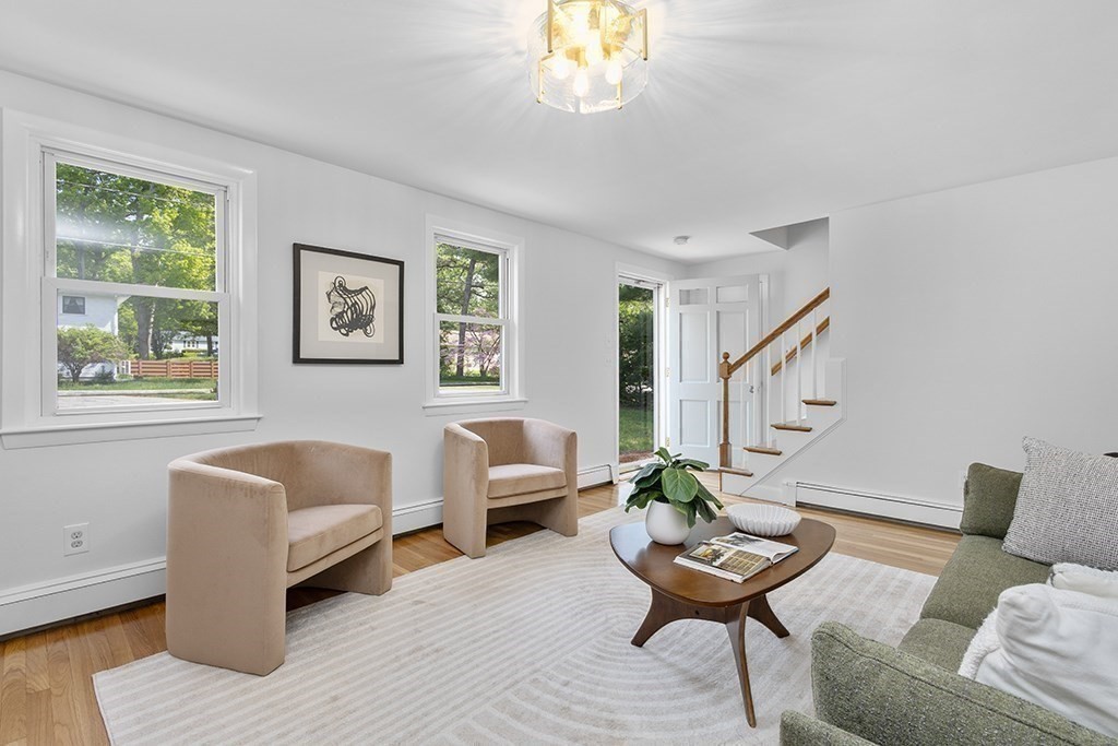 117 Oak Ridge Drive Ayer, MA 01432 - Photo 6 of 26 a living room with furniture and a large window