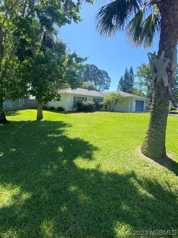 a view of a backyard with a garden
