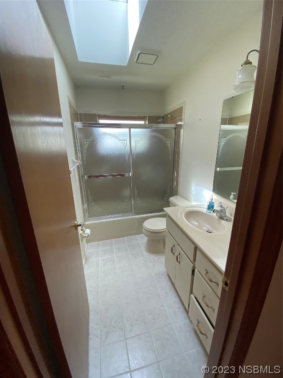 1603 Willow Oak Drive Edgewater, FL 32132 - Photo 23 of 26 a bathroom with a granite countertop sink a toilet and shower