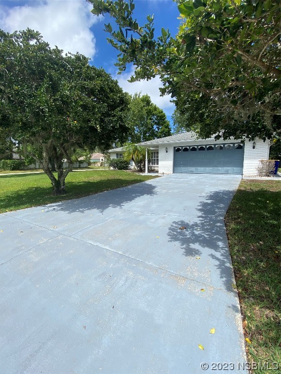 1603 Willow Oak Drive Edgewater, FL 32132 - Photo 4 of 26 a view of a garden