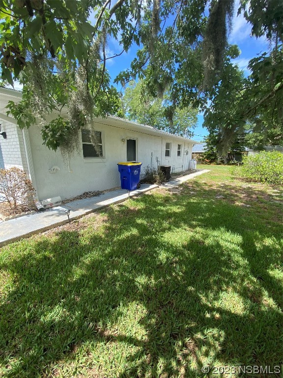 1603 Willow Oak Drive Edgewater, FL 32132 - Photo 5 of 26 a house view with a backyard space