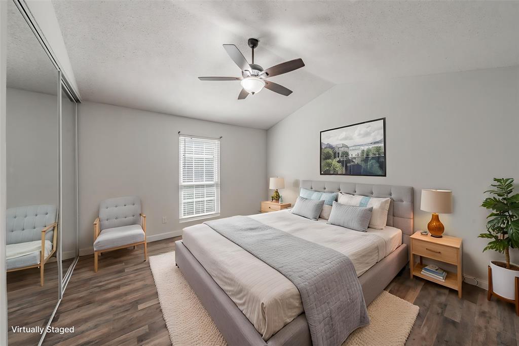 193 Merlin Way Euless, TX 76039 - Photo 18 of 35 Virtually staged bedroom with vaulted ceiling bedroom featuring ceiling fan for added comfort.