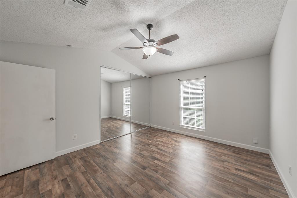 193 Merlin Way Euless, TX 76039 - Photo 20 of 35 Bedroom with mirrored closet.