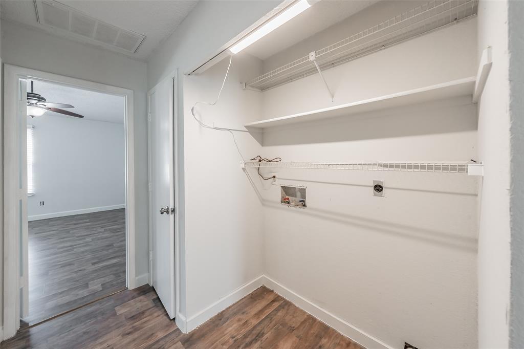 193 Merlin Way Euless, TX 76039 - Photo 23 of 35 Dedicated laundry area featuring shelving, a utility light, and hookups for full size washer & dryer
