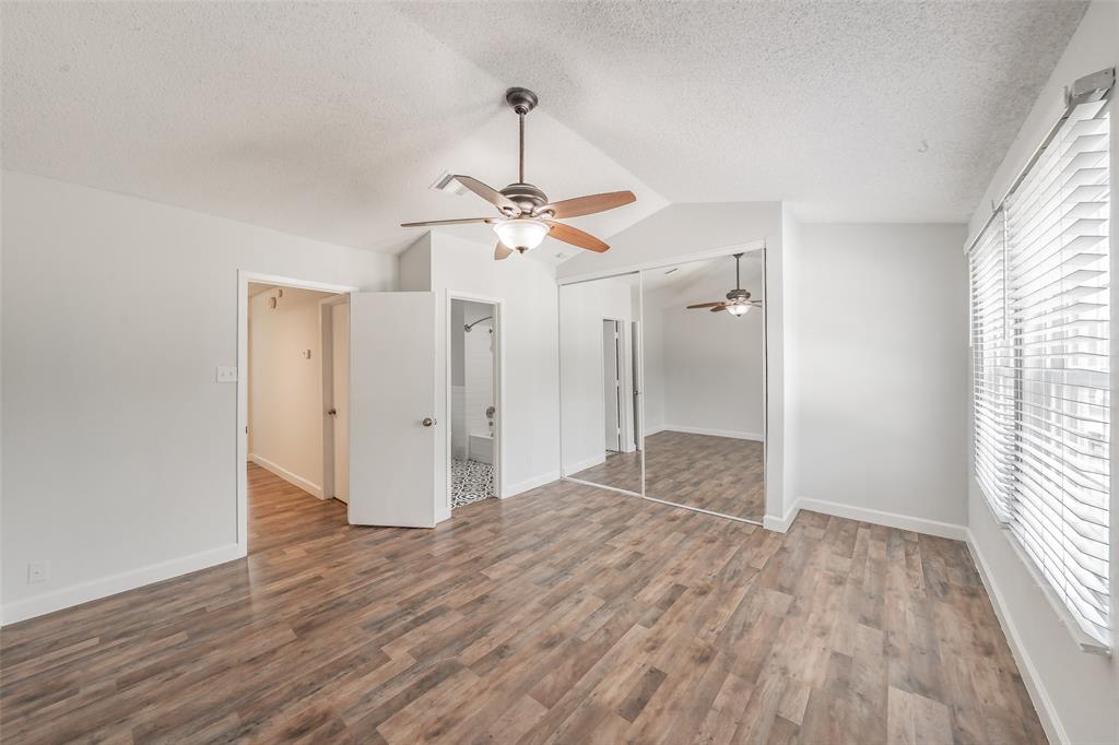 193 Merlin Way Euless, TX 76039 - Photo 27 of 35 Bedroom with attached private bathroom.