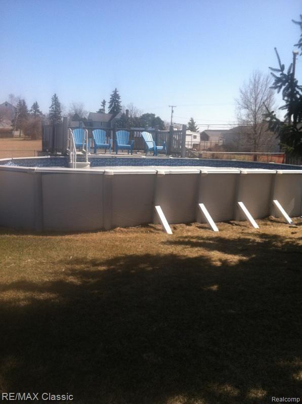 17305 Elwell Road Belleville, MI 48111 - Photo 29 of 30 2006 built 30x15' 48" deep with trex deck and new liner