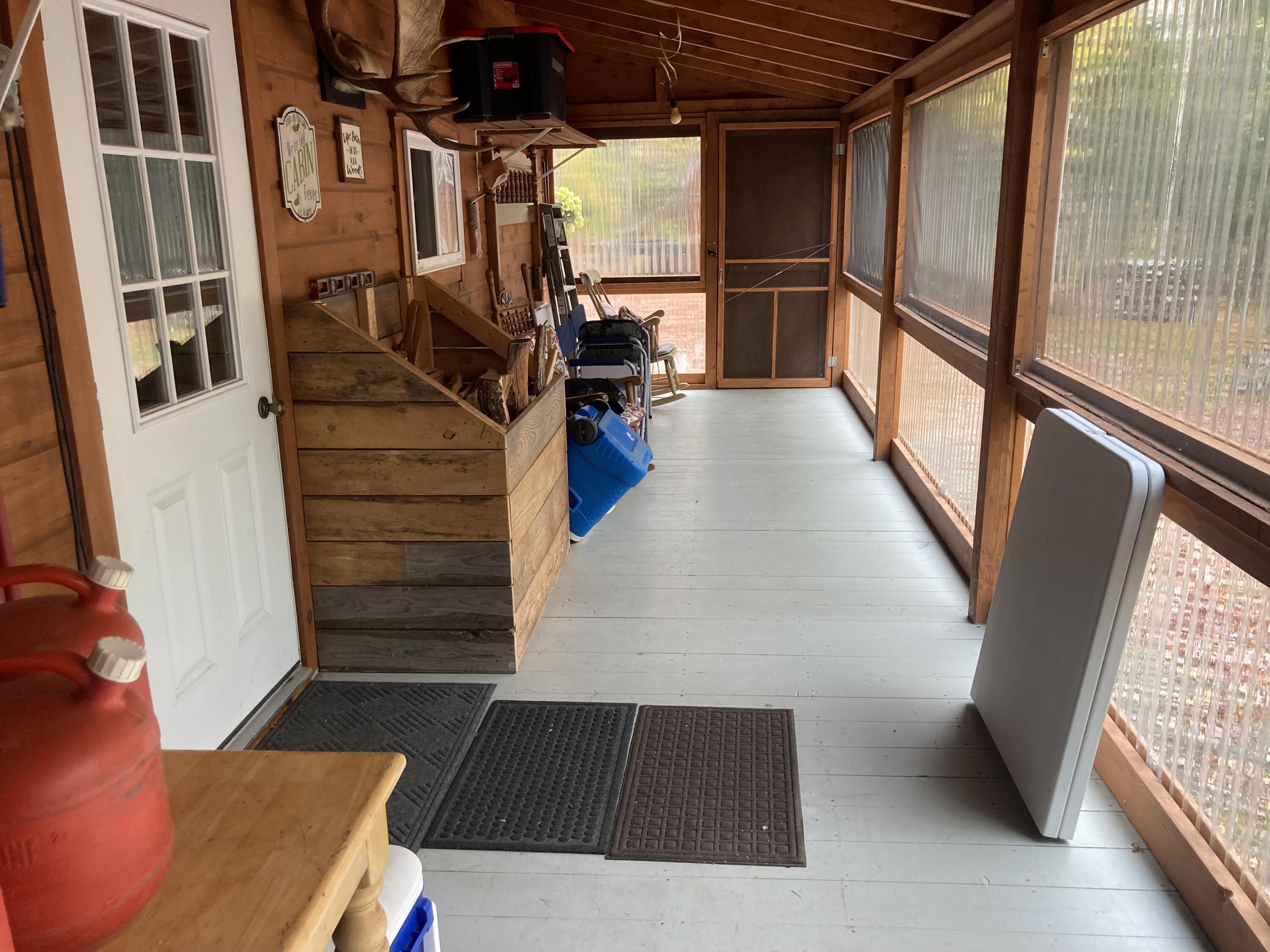 999 Upper Lapomkeag Road Oxbow, ME 04764 - Photo 9 of 41 Inside Porch