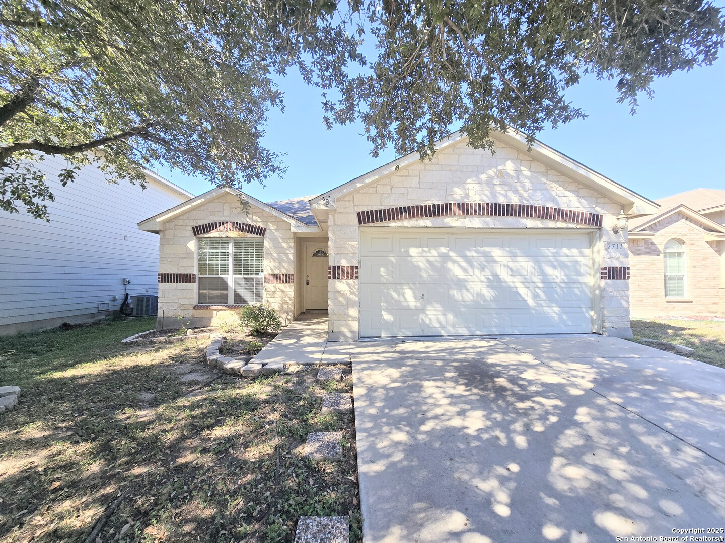 2711 Skybound San Antonio, TX 78245 - Photo 2 of 23 a view of a house with a yard