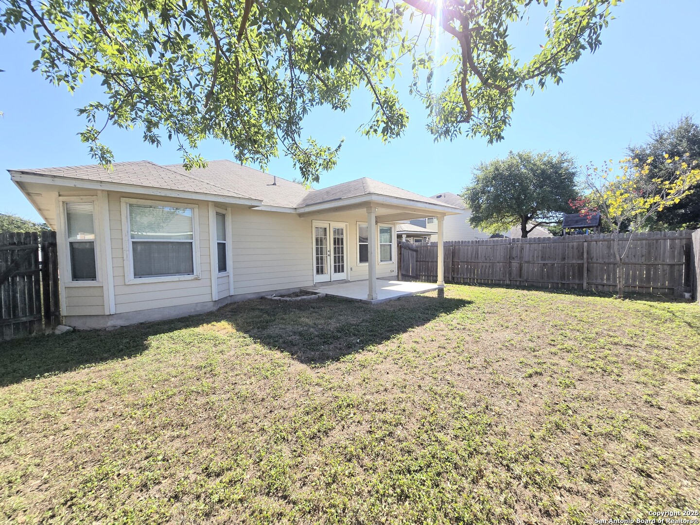 2711 Skybound San Antonio, TX 78245 - Photo 22 of 23 a front view of a house with a yard