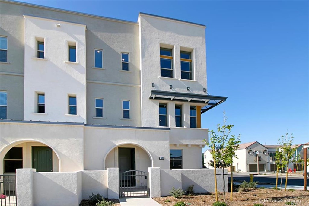 152 Paramount Irvine, CA 92618 - Photo 1 of 1 a front view of a house with outdoor space