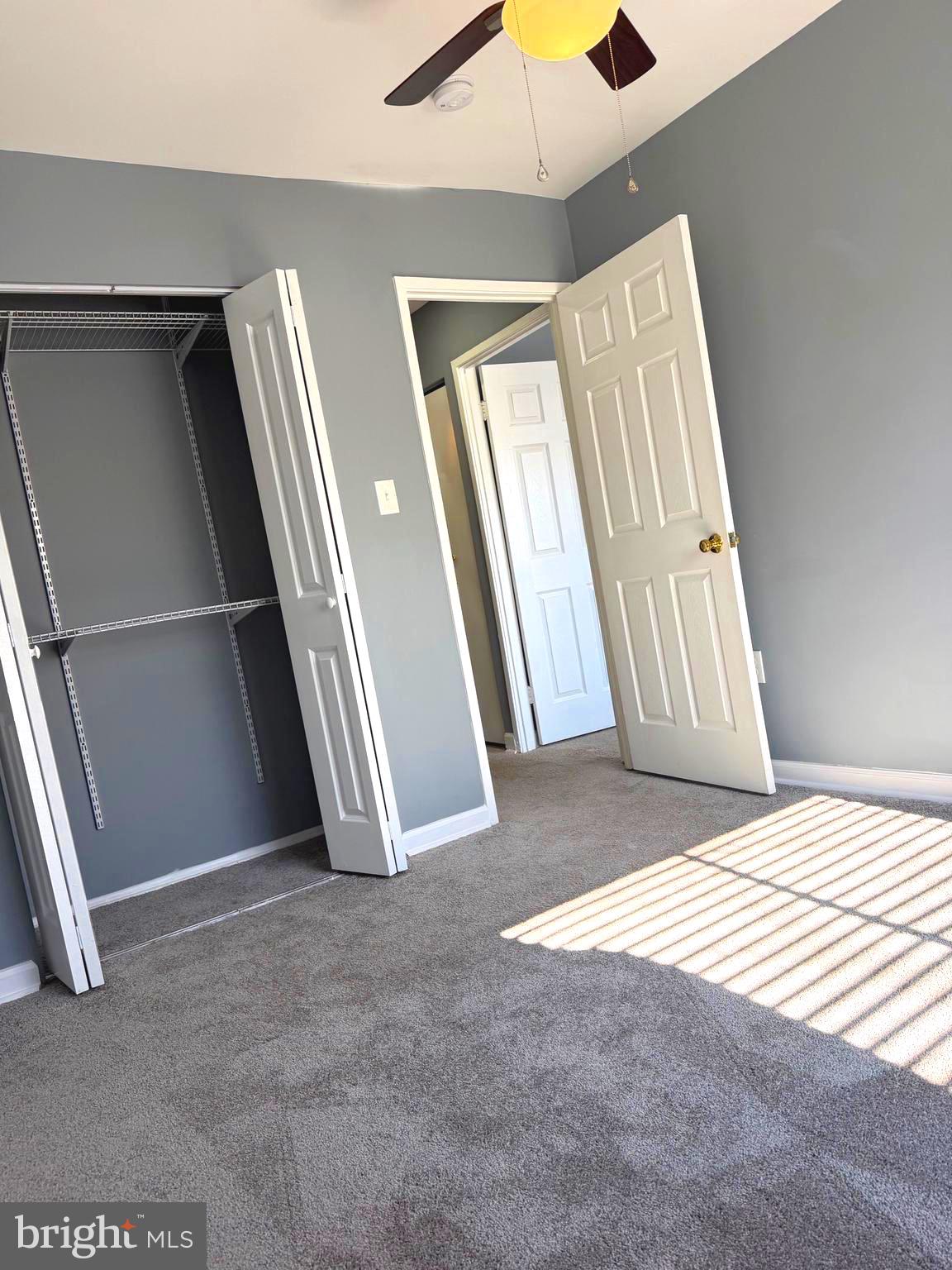 2346 Sun Valley Circle, Unit 2A Silver Spring, MD 20906 - Photo 11 of 21 a view of empty room with stairs and wooden floor
