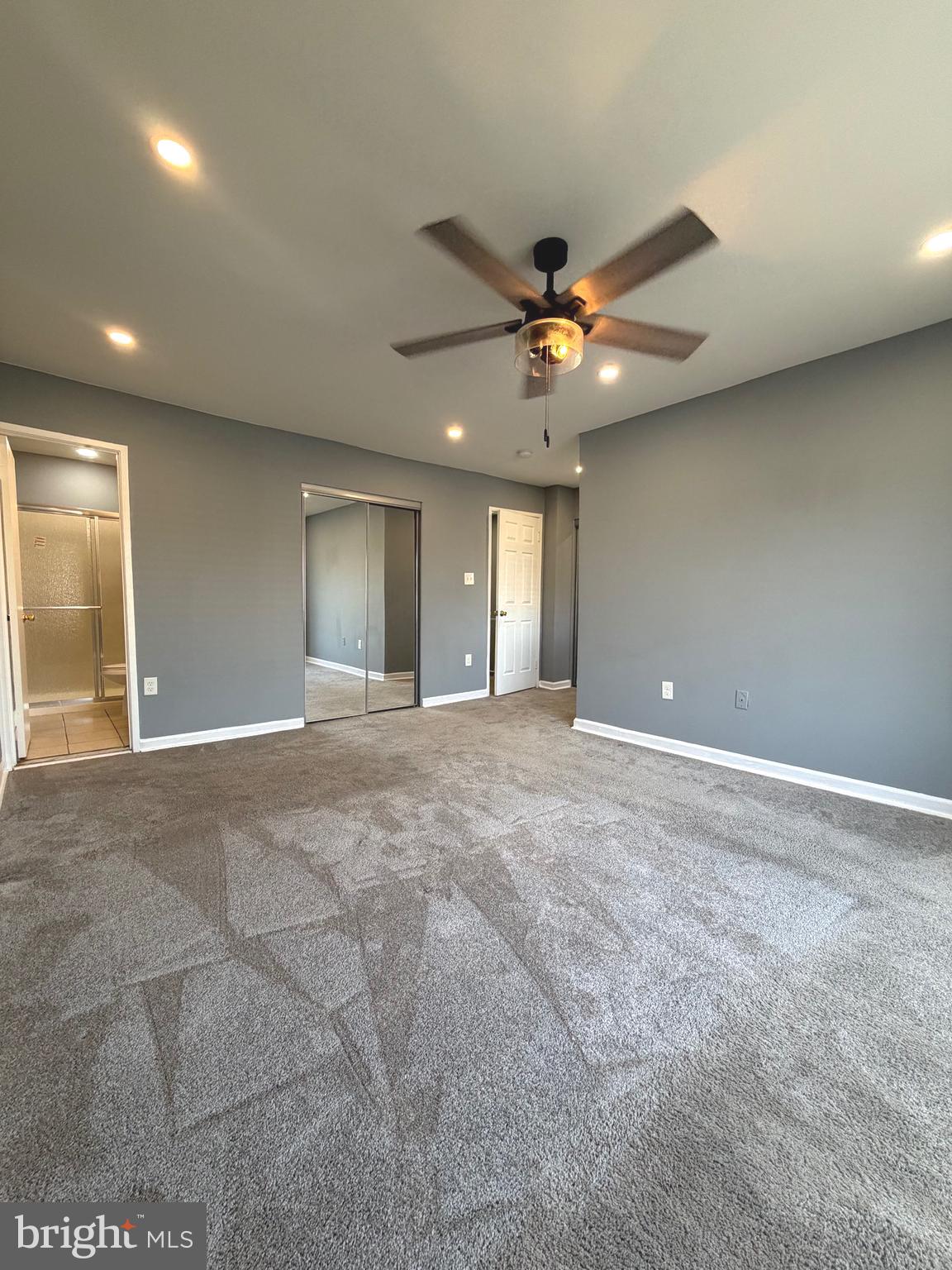 2346 Sun Valley Circle, Unit 2A Silver Spring, MD 20906 - Photo 14 of 21 a view of an empty room and a ceiling fan