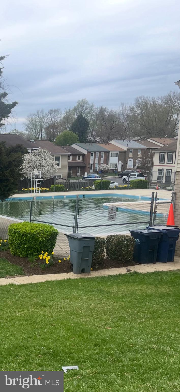 2346 Sun Valley Circle, Unit 2A Silver Spring, MD 20906 - Photo 20 of 21 a view of a lake with a big yard