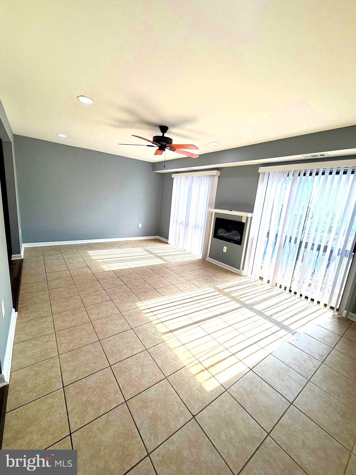 2346 Sun Valley Circle, Unit 2A Silver Spring, MD 20906 - Photo 6 of 21 a view of a livingroom with a furniture and a ceiling fan